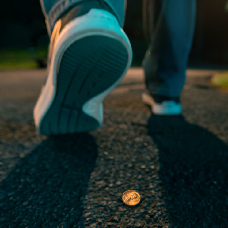 Man leaving behind a lucky penny